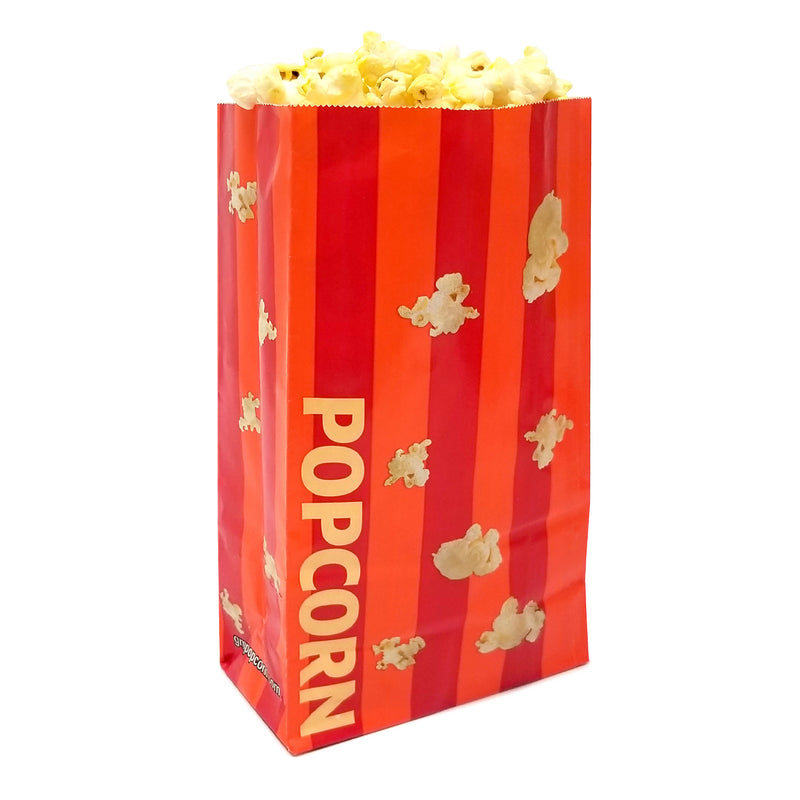 orange and red striped popcorn bag filled with popcorn