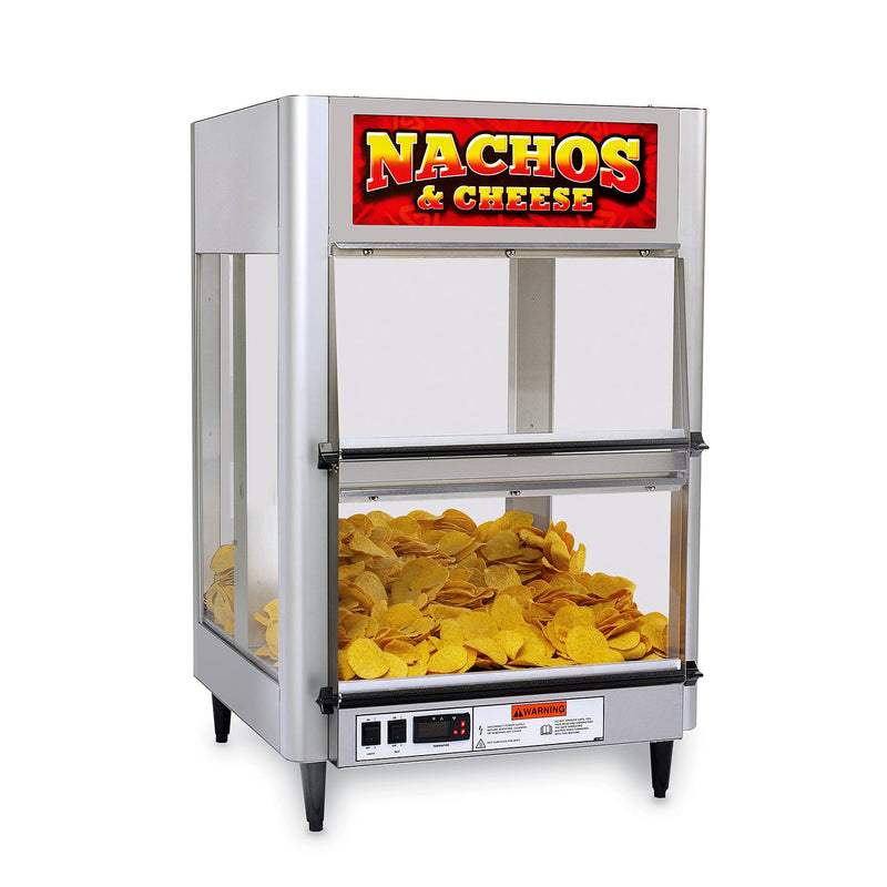Warming cabinet with four rounded metal corner posts and plexi-glass sides. Pile of nacho chips in warmer with opening to scoop them out at the front of machine. Yellow and red sign on the dome states Nachos and Cheese. Control panel is on the front lower left of machine, standing on 4 short legs.