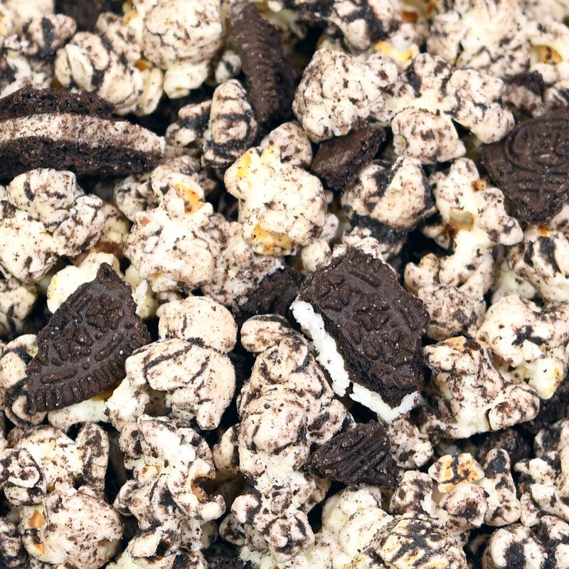 Up close shot of OREO® Popcorn made of crumbled cookie pieces, popcorn and OREO® cream.