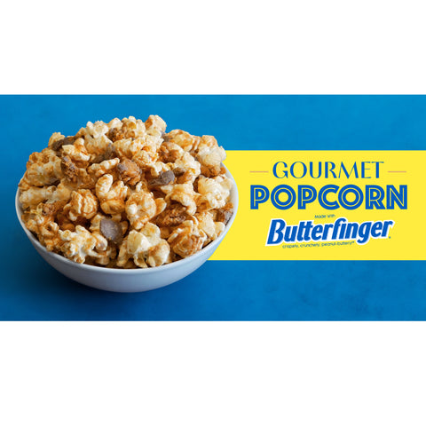 Bowl of gourmet popcorn made with butterfinger pieces.