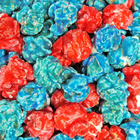 Close up view of Icee cherry and blue raspberry flavored candy coated popcorn