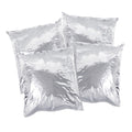 Four square silver mylar bags filled with popcorn, arranged overlapping on a plain white background.