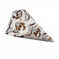 Brown and white printed paper cone folded over holding frosted nuts. 