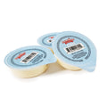Three small round plastic containers of icing cups with light blue lids, arranged on a white background.