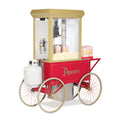 red and gold antique-style popcorn cart with propane-powered popper, glass cabinet filled with fresh popcorn, and vintage wagon wheels, designed for concession stands and events.