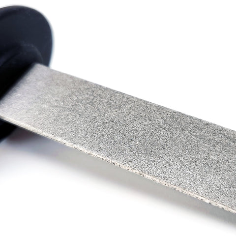 closeup of file texture on double side diamond file blade sharpener with rubberized handle