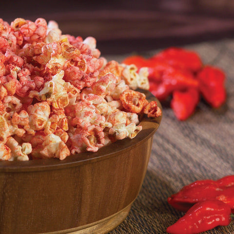 ghost pepper popcorn shown in wooden bowl