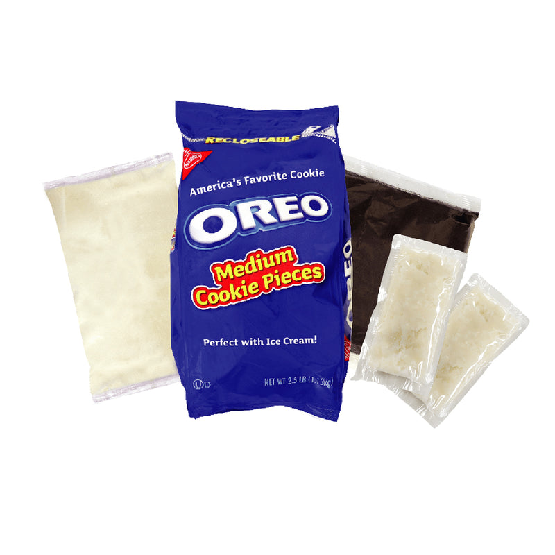 blue bag of Oreo Cookie pieces, clear bag of white crème, clear bag of Oreo base cake, and two pouches of white coconut oil