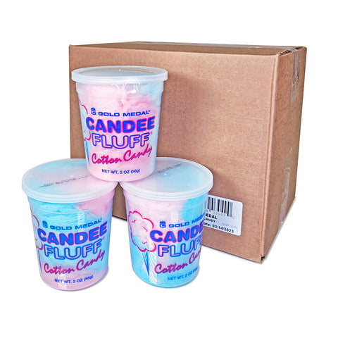 three plastic containers of cotton candy next to a brown cardboard box