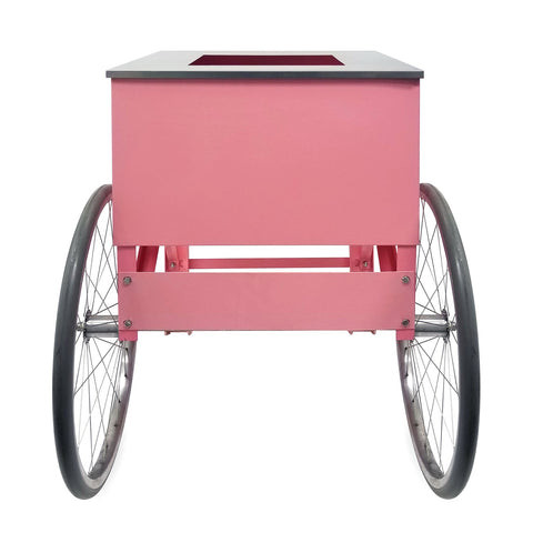 side view of wheels on two-wheeled pink cotton candy cart