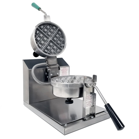 Angle view of two, silver, removable round belgian waffle deep square grids, opened, with a black handle on bottom grid and green handle on top grid. Baker is mounted on silver base with dial temperature control panel behind the grids. 