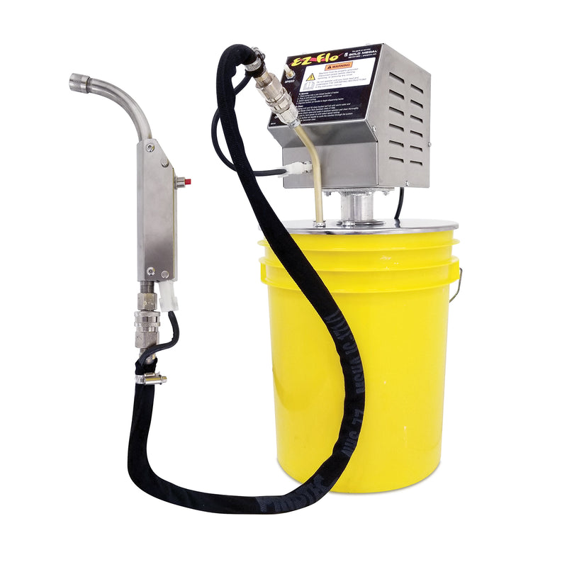 Yellow bucket with enclosed batter motor mounted on top. A long black tube with a motorized spout at the end is hooked up to the mounted motor. The spout has a red button to control dispensing batter.