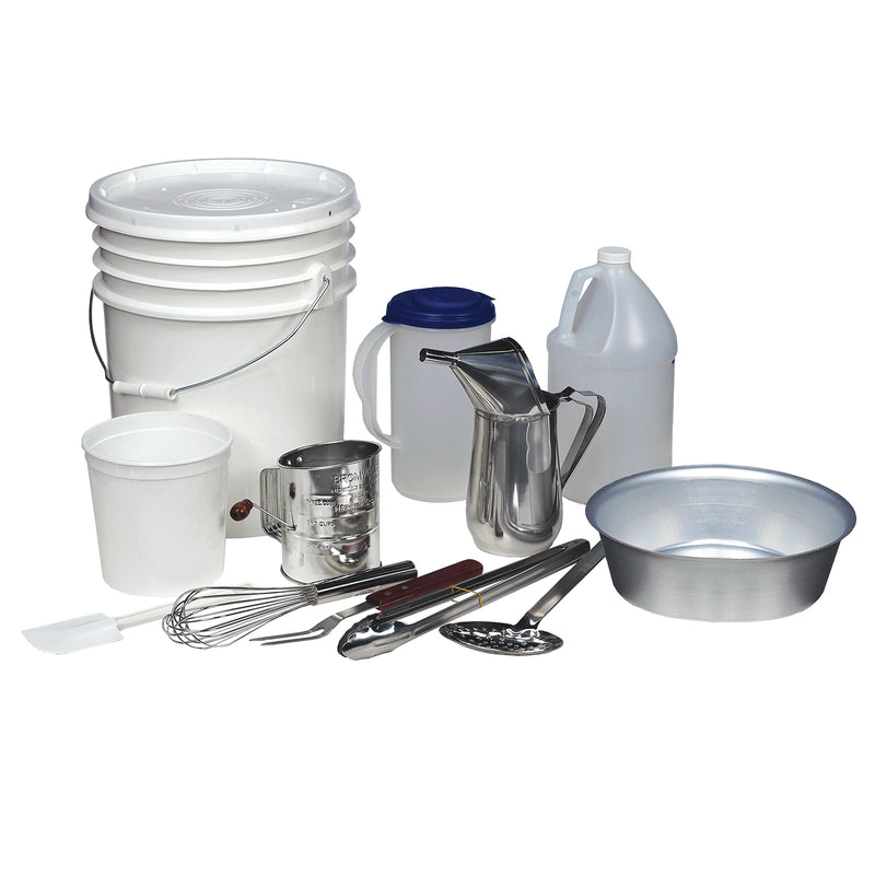 Funnel Cake Tool Kit containes white bucket, smaller white tub, two quart plastic pouring pitcher, clear plastic pitcher, metal whisk, metal skimmer, white spatula, powdered sugar sifter, sugaring pan, measuring jug, two prong fork, and tongs.