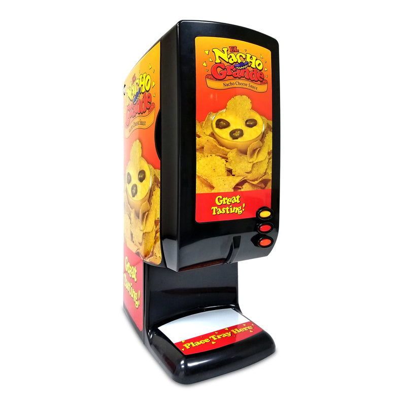 Angle view of black bag cheese dispenser machine, with rounded corners, graphic of nachos and cheese sauce in a bowl, and the words El Nacho Grande Nacho Cheese Sauce on the front and side of machine. This has 3 buttons, one yellow, one red, and one orange that controls the dispense rate. Under dispenser is a flat area to place tray.