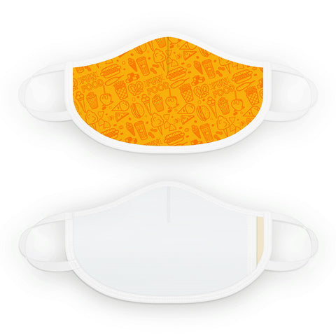 Cloth face mask with white trim and yellow face covering with line drawings of of cotton candy, pretzels, hot dogs, nacho and cheese, and popcorn in orange. Back of mask is all white.